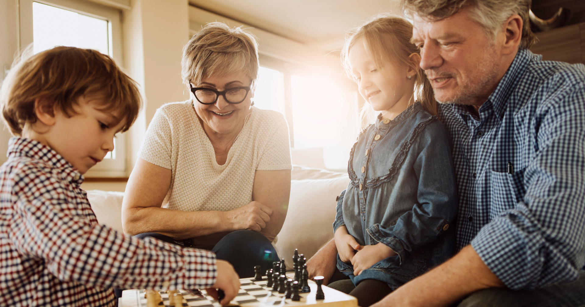 Playing-Chess-Grandchildren-Grandparents-Cozy-Home-55+-Community